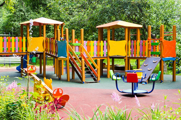 "nDeserted childern's Playground in city Park in summer. aire de jeux enfants camping